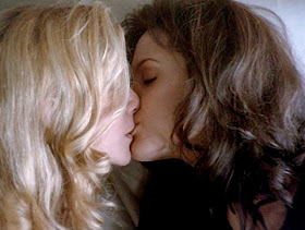 Lesbian kiss between Angelina Jolie and Elizabeth Mitchell in "Gia&quo...