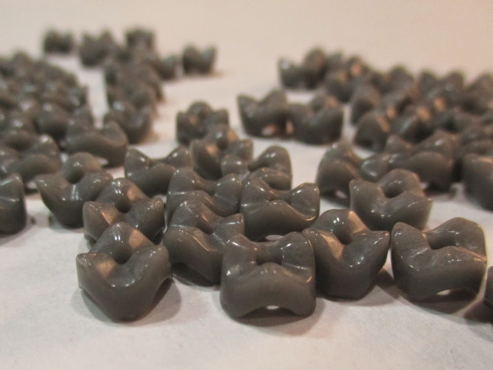 Grey glass vertebrae beads.