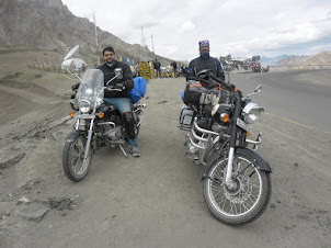 Two Bikers doing the "Delhi-Srinar-Leh-Manali-Delhi"  highway route on their Bikes.