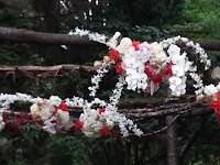 Flowers decorating the wedding arch at JM Cellars - Photo by Patricia Stimac The wedding arch at JM Cellars - Photo by Patricia Stimac, Seattle Wedding Officiant