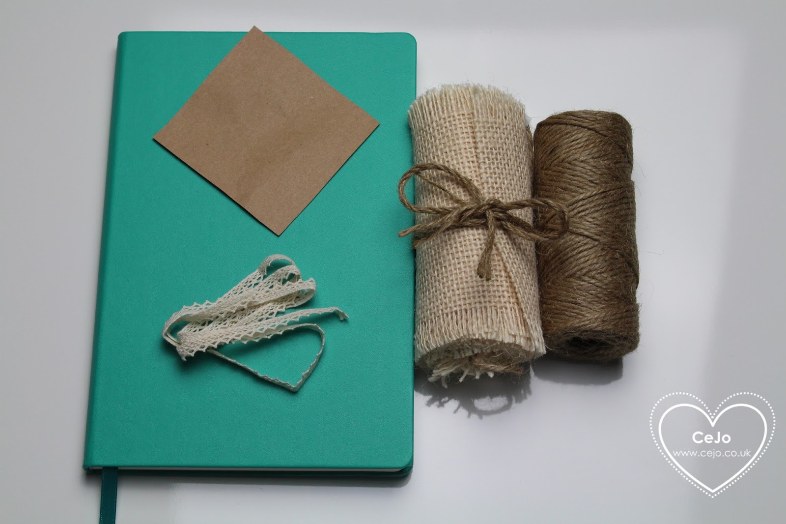 notepad, kraft paper, lace, cream hessian and twine
