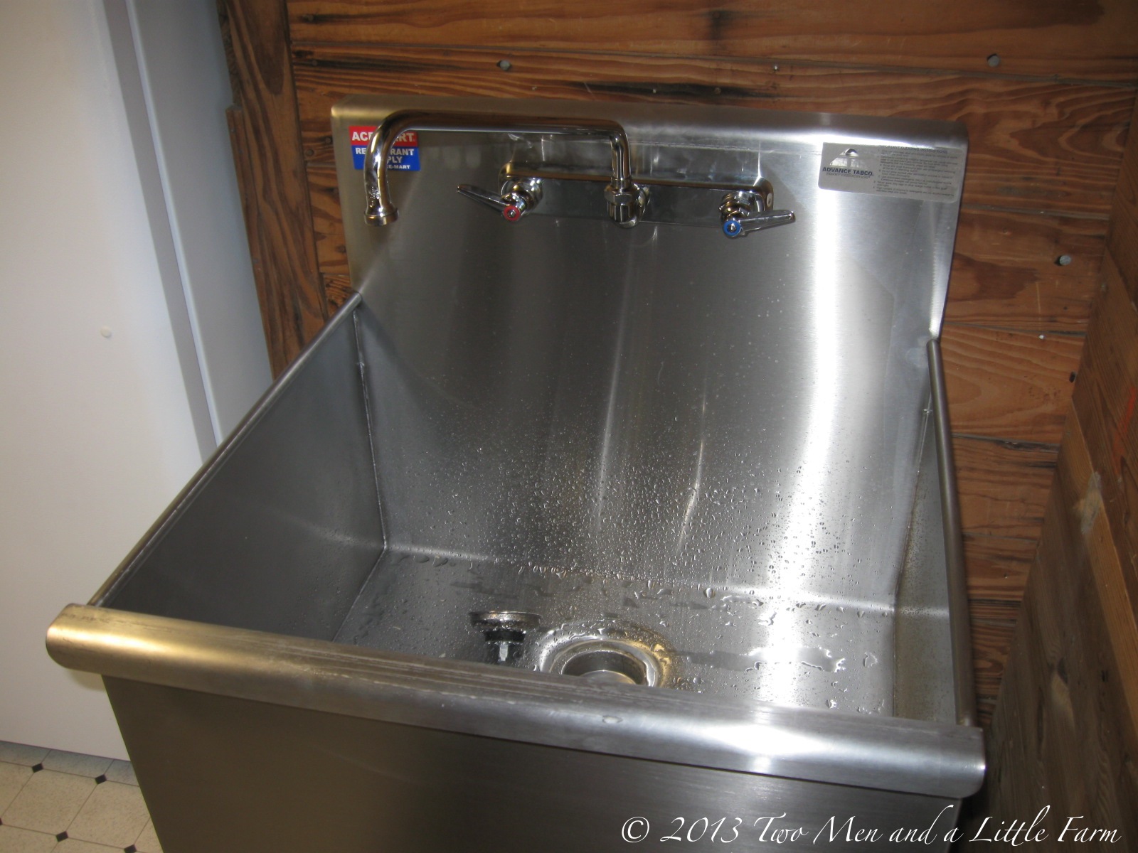 Two Men And A Little Farm Utility Sink In The Mudroom