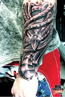 3d biomechanical tattoo on the forearm: alien arm