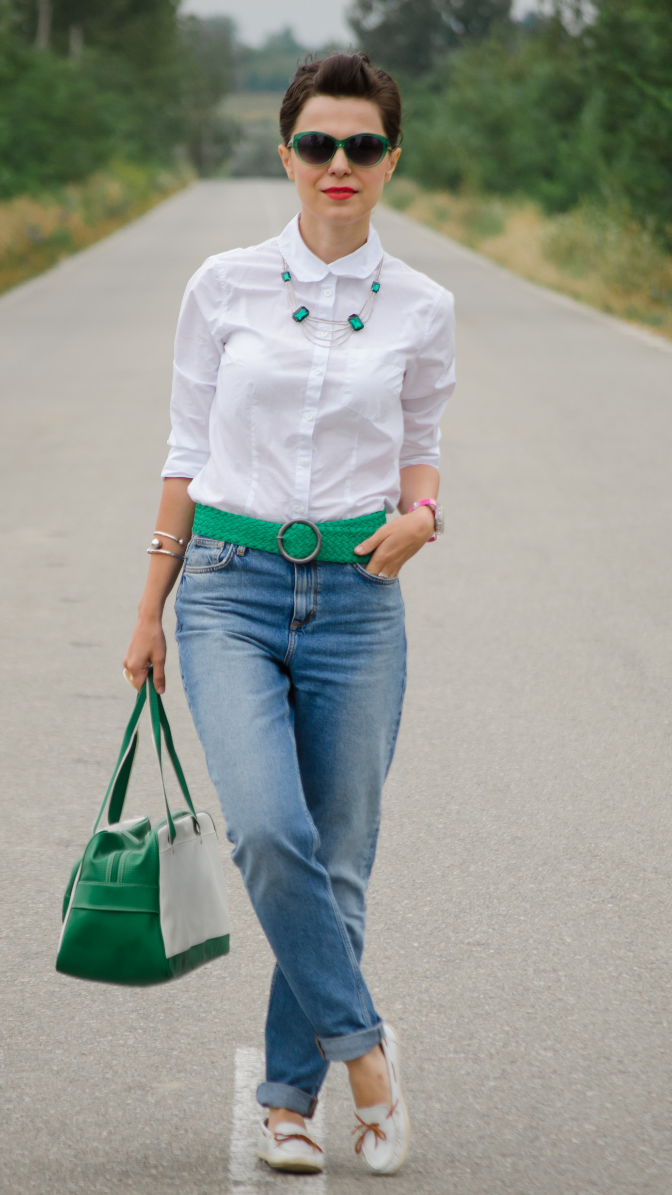 back to school outfit mom jeans white loose boyfriend shirt green belt white loafers nike bag statement necklace emerald green