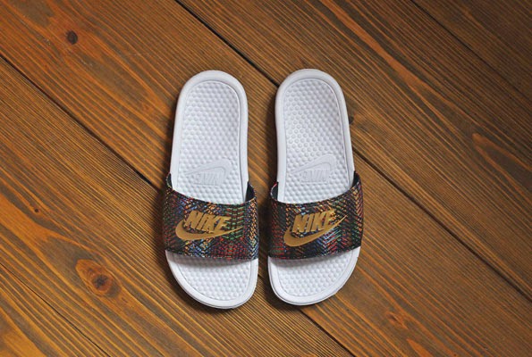 nike black and gold sliders