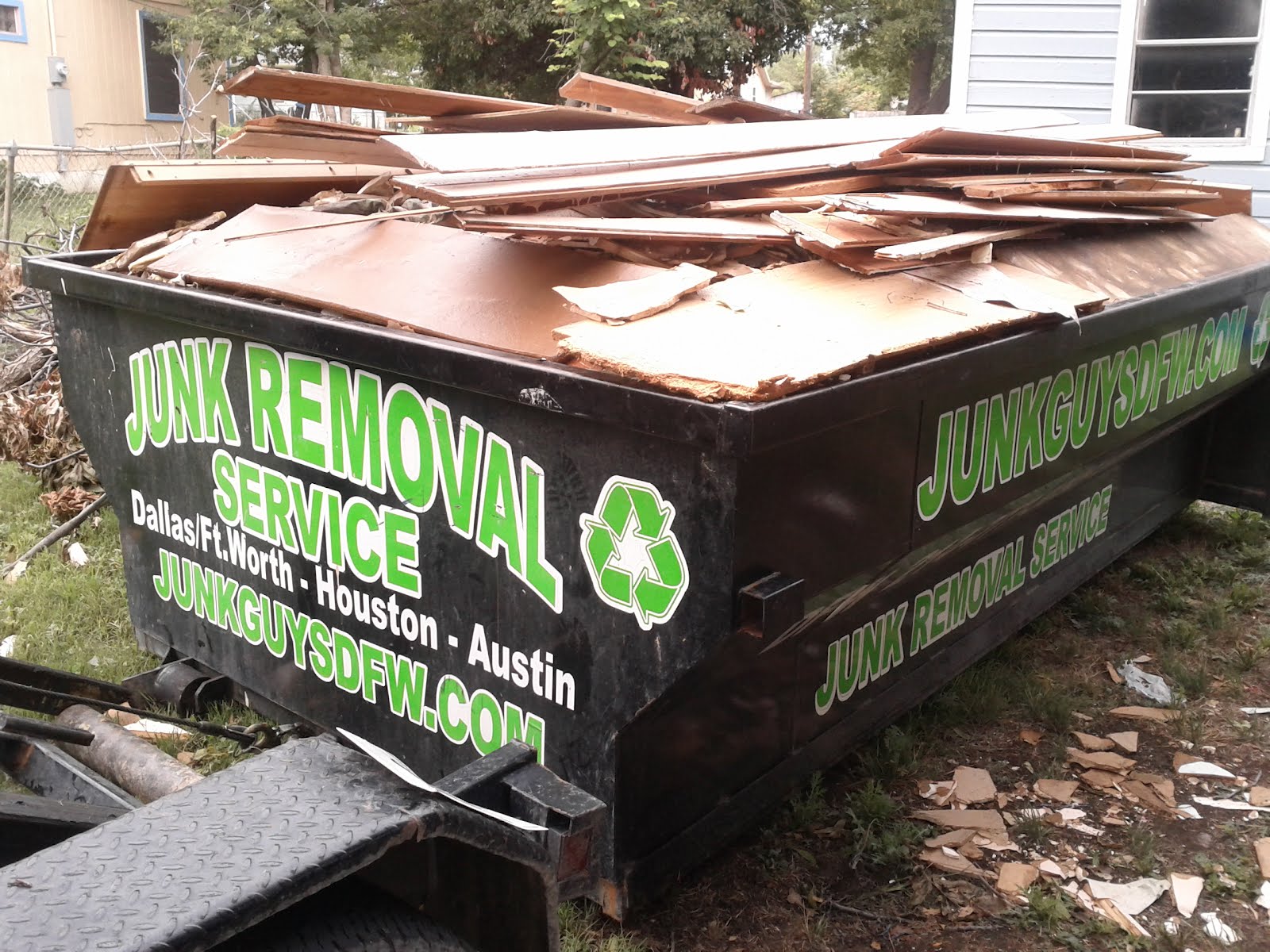 Trash Hauling and Garbage Hauling with a Houston dumpster Junk