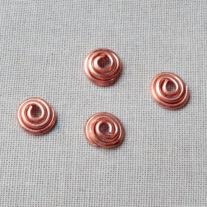 Love these wire spiral bead caps! Free Tutorial at Lisa Yang's Jewelry Blog