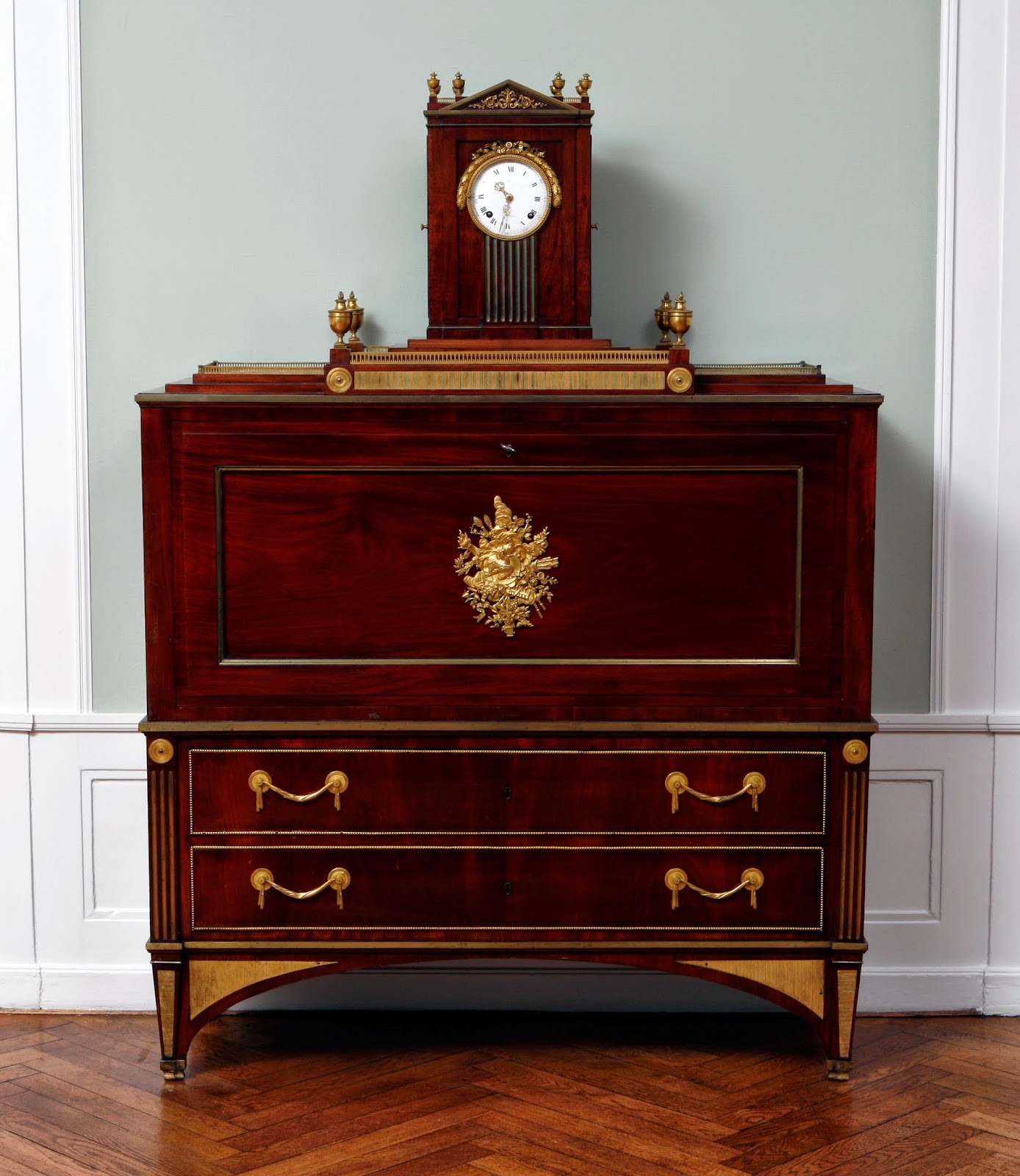 Secretaire with clock; mahogany, with gilded bronze and brass David Roentgen, movement by Peter Kinzing, Germany, 1780-1790