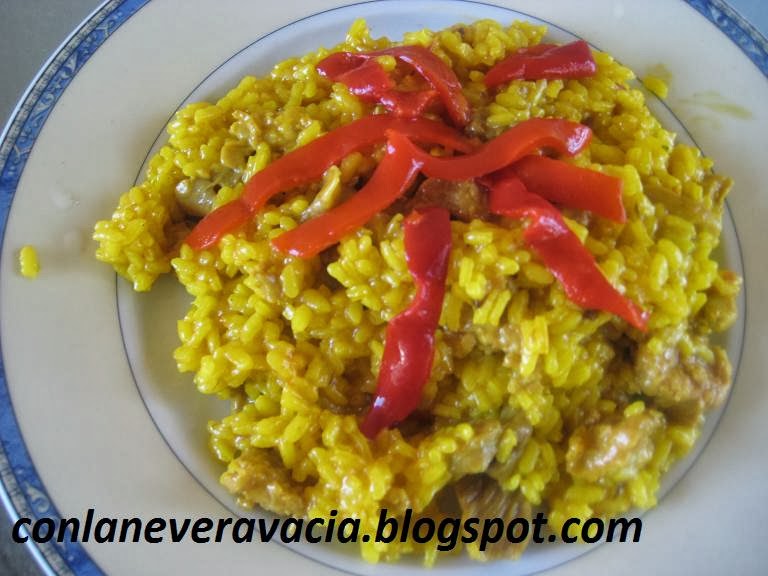 Arroz A La Cazuela Con Pollo Y Longaniza.
