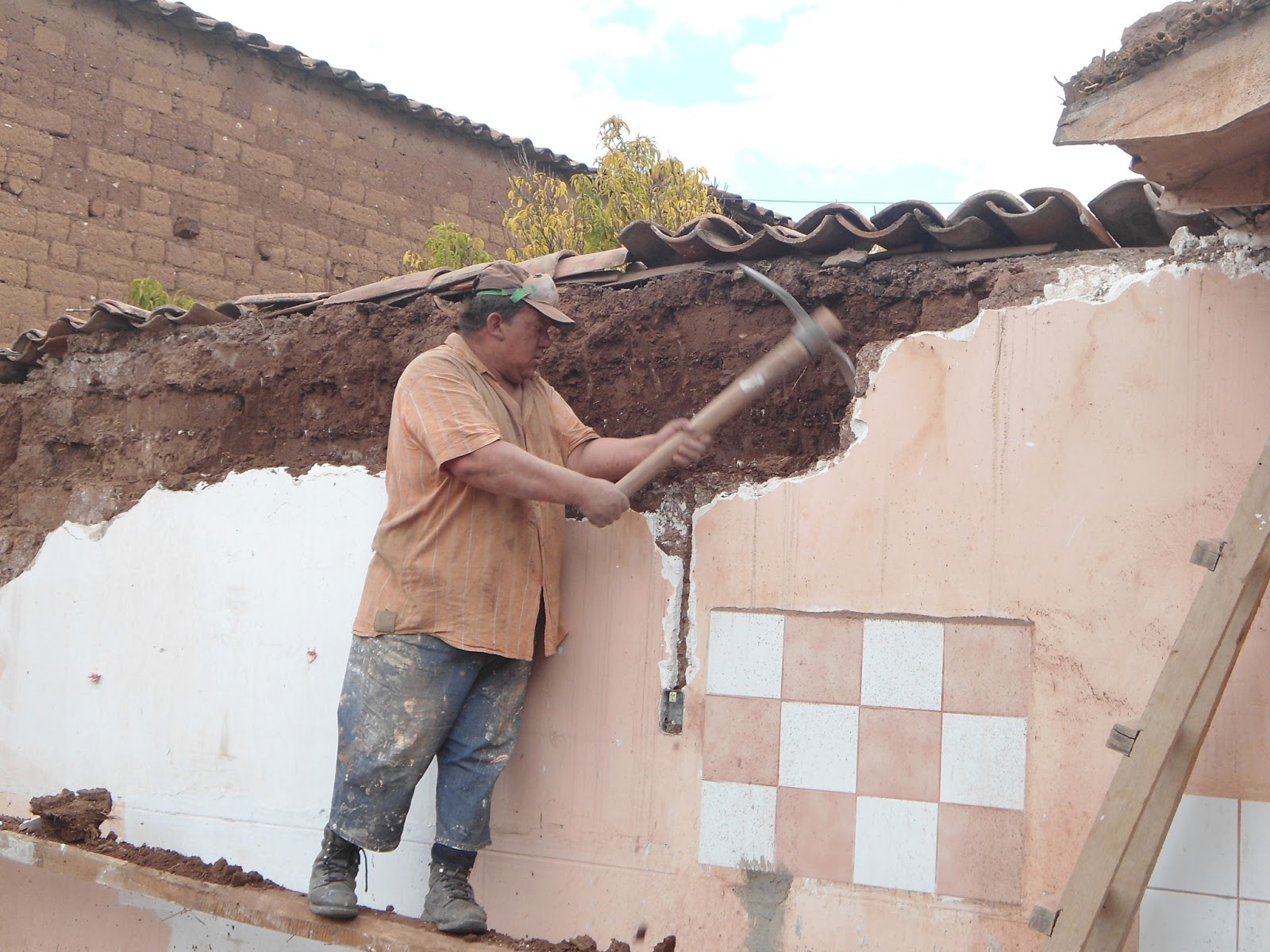 Williamson Family in Peru Tearing down the walls.