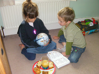 using a globe to identify animal origins