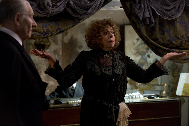 Sir Ian McKellan as Sherlock Holmes & Frances de la Tour as Madame Schirmer in Mr. Holmes