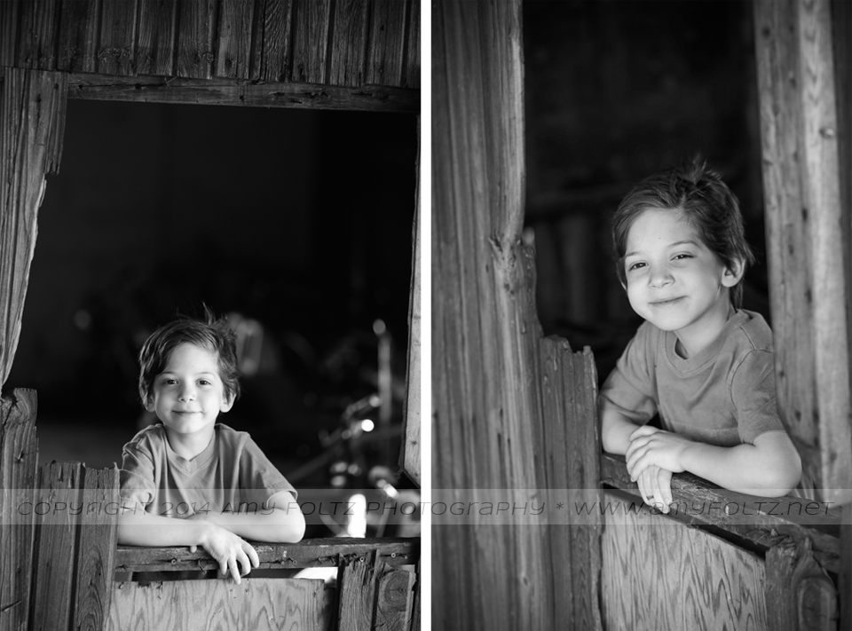 photo of a young boy inside an old barn