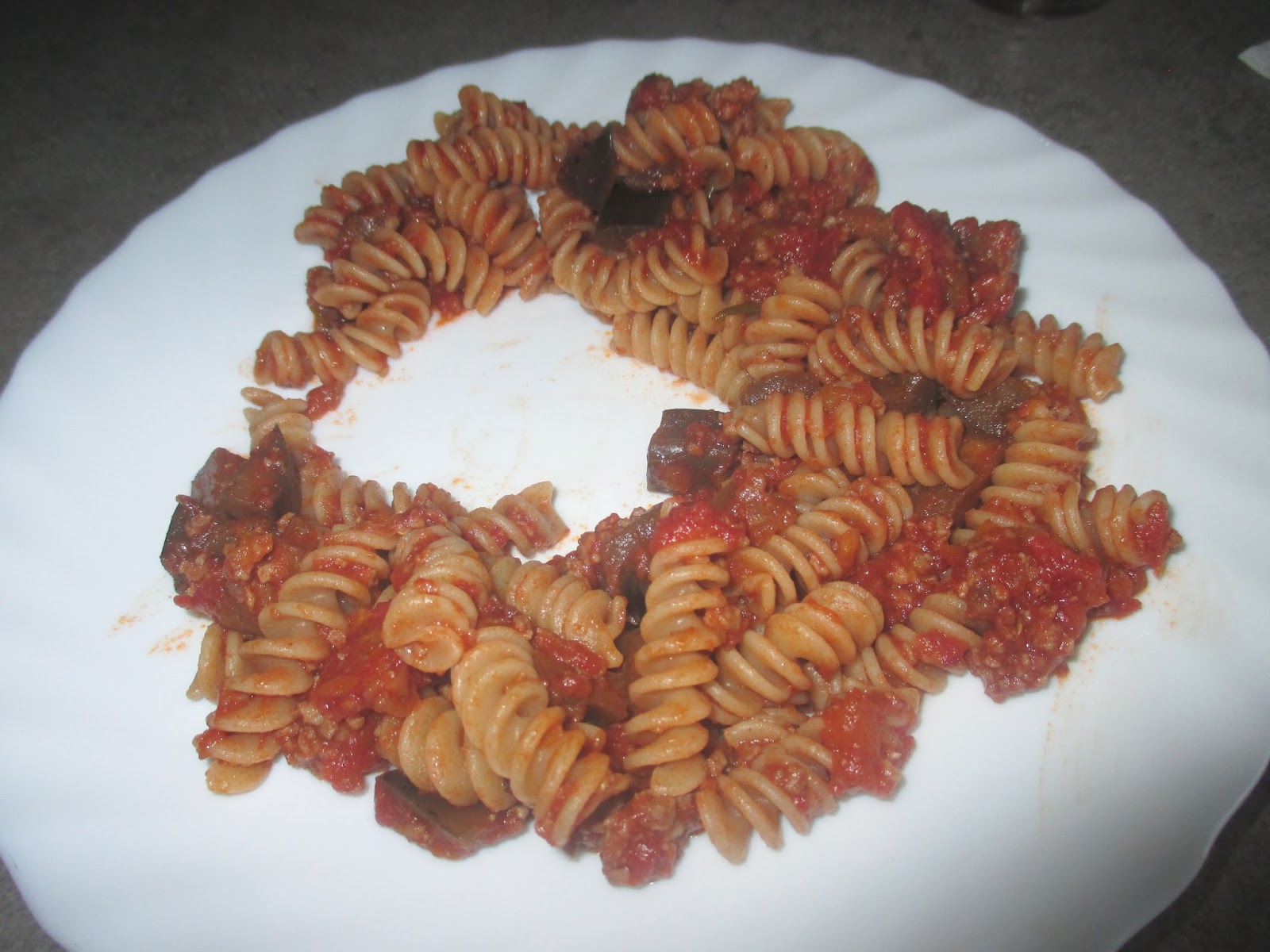 FUSILLI PASTA WITH BOLOGNESE RAGOUT AND EGGPLANTS Fusilli con ragout alla bolognese e