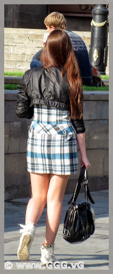 Girl in black leather jacket on the street 