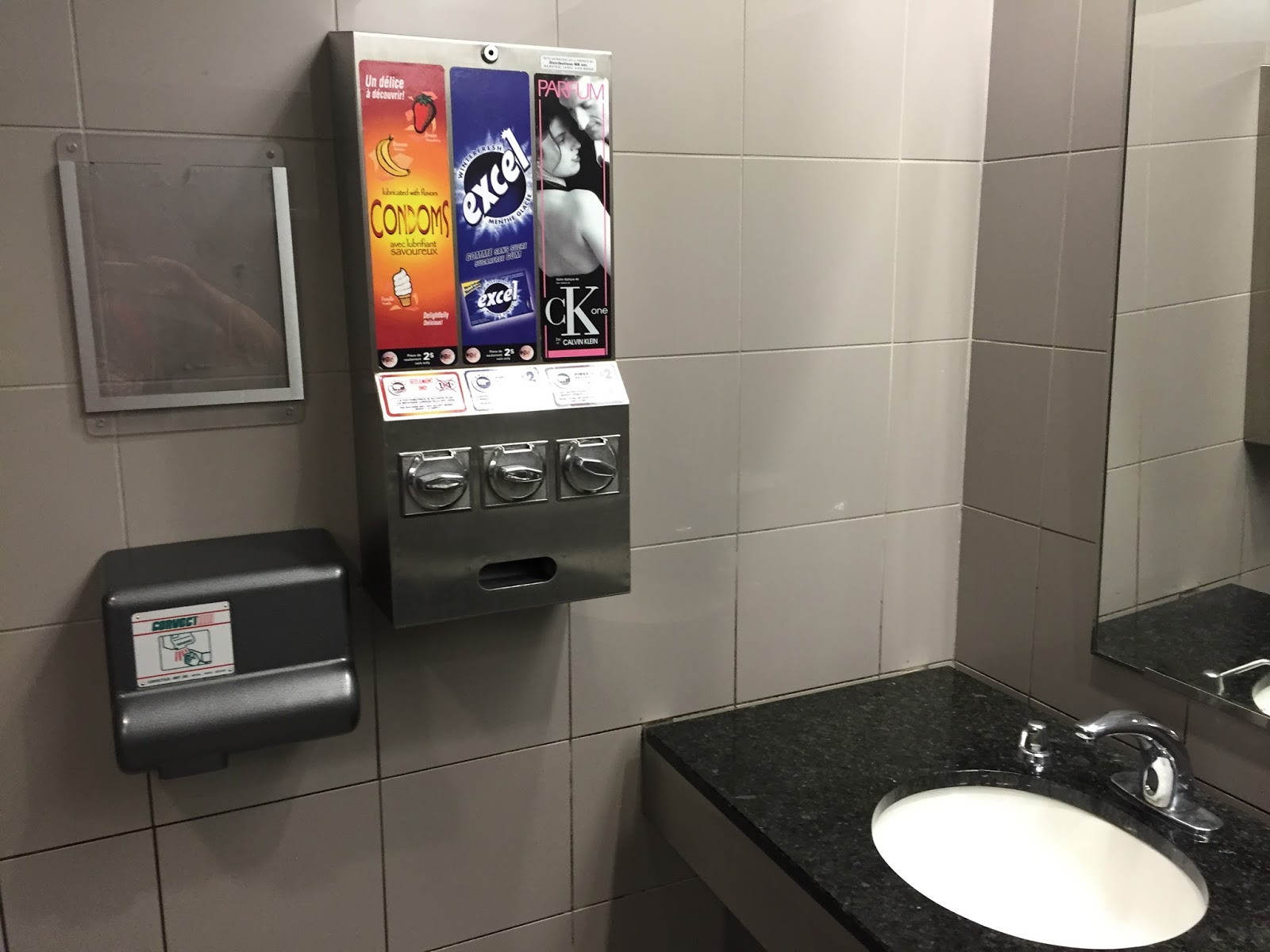 bathroom condom dispenser Bathroom condom dispenser