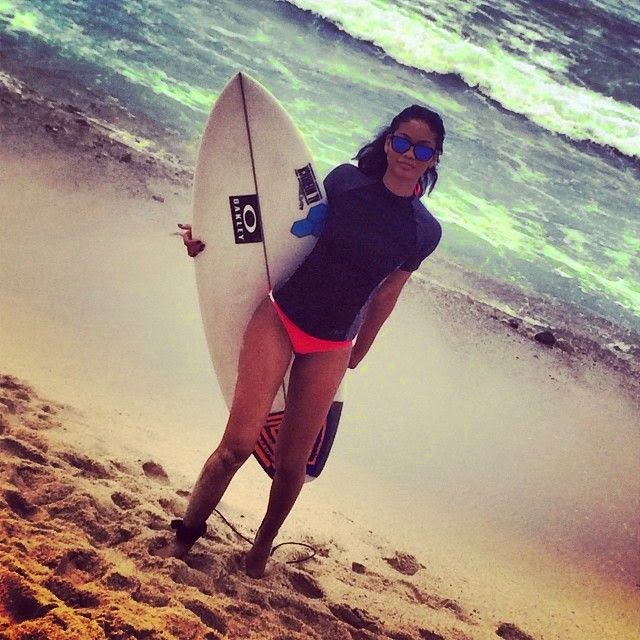 Chanel Iman goes barefoot in a Pink Bikini on holiday in Mexico On Monday, June 23, 2014, she learned a surfboard with professional surfer, Mali Ward and joined an Oakley party with Lea Michele and Kellan Lutz.