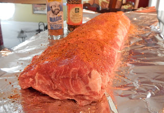 BBQ Ribs being prepared with pepper and spices before going in the BBQ