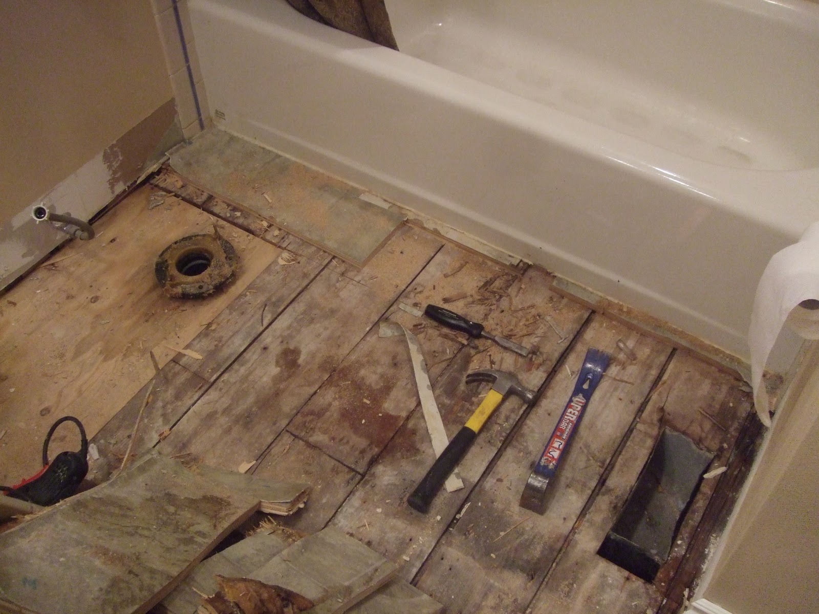 The Smiths Laying bathroom wood flooring