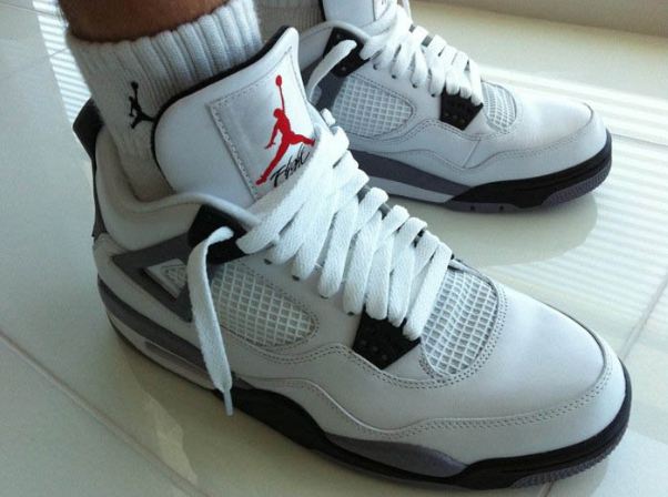 jordan 4 white cement on feet