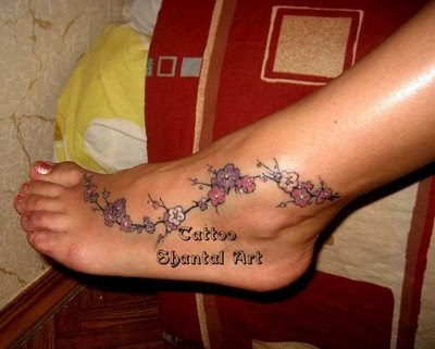 hawaiian flower tattoos on foot Best Tribal Foot Tattoos