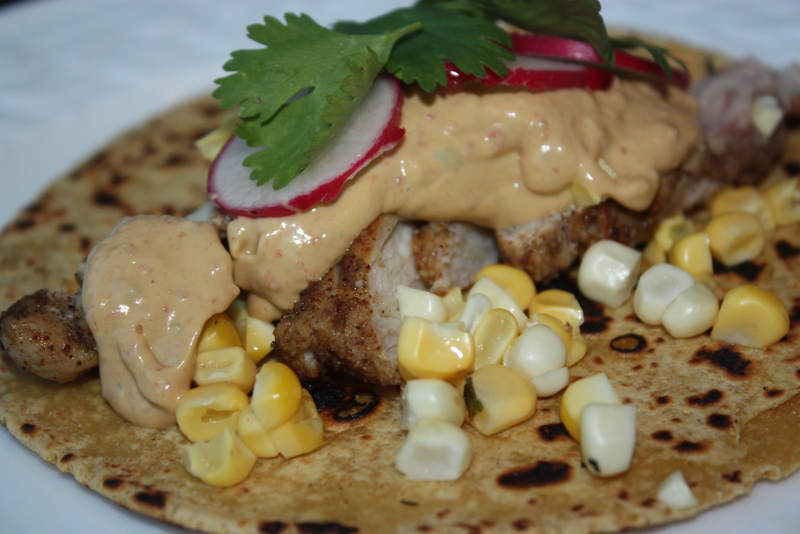 Chicken Tacos with Corn, Radish & ChipotleAvocado Sour Cream