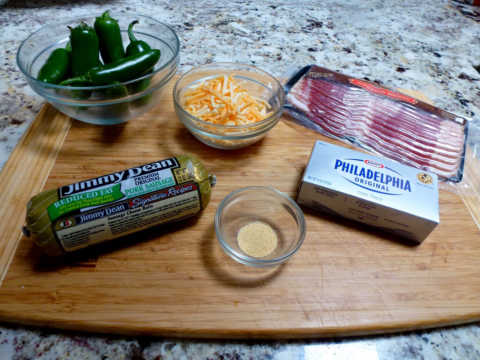 Hardly Housewives Sausage Stuffed Bacon Wrapped Jalapeno Poppers