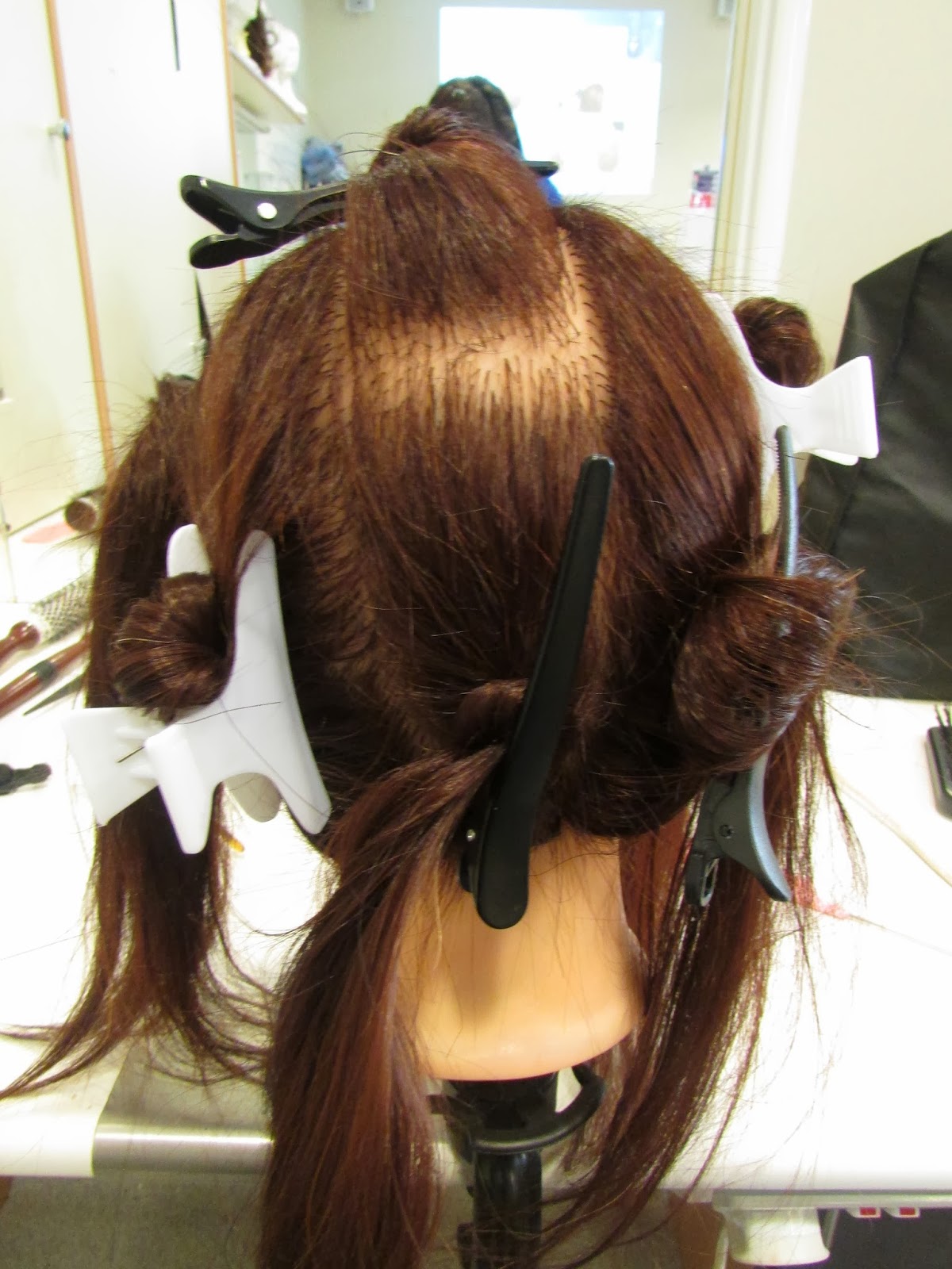 Natasha Oxtoby Hairdressing, first vertical roll.