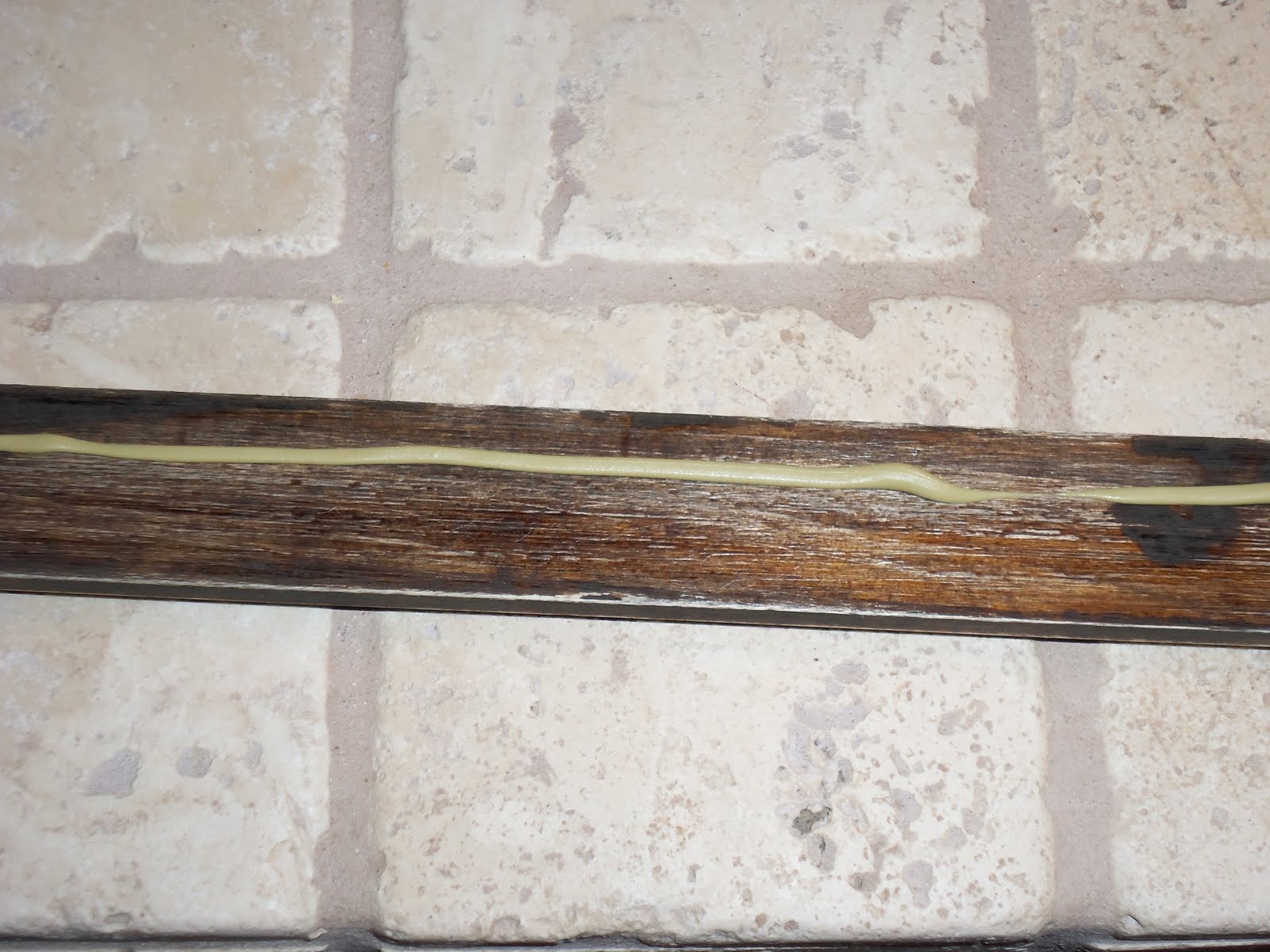 How to glue wood moulding to a mirror to create a faux frame