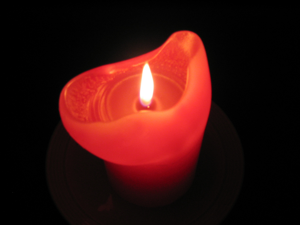A lit red candle