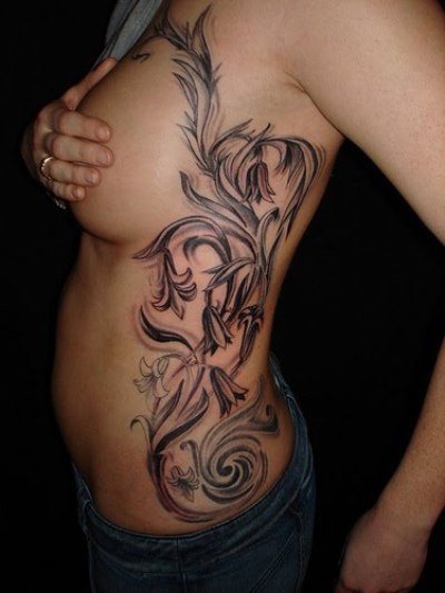 vine tattoo. Flower Vine Tattoo Designs The