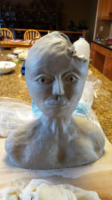 Ceramic pottery sculptural bust of negro woman, in progress.