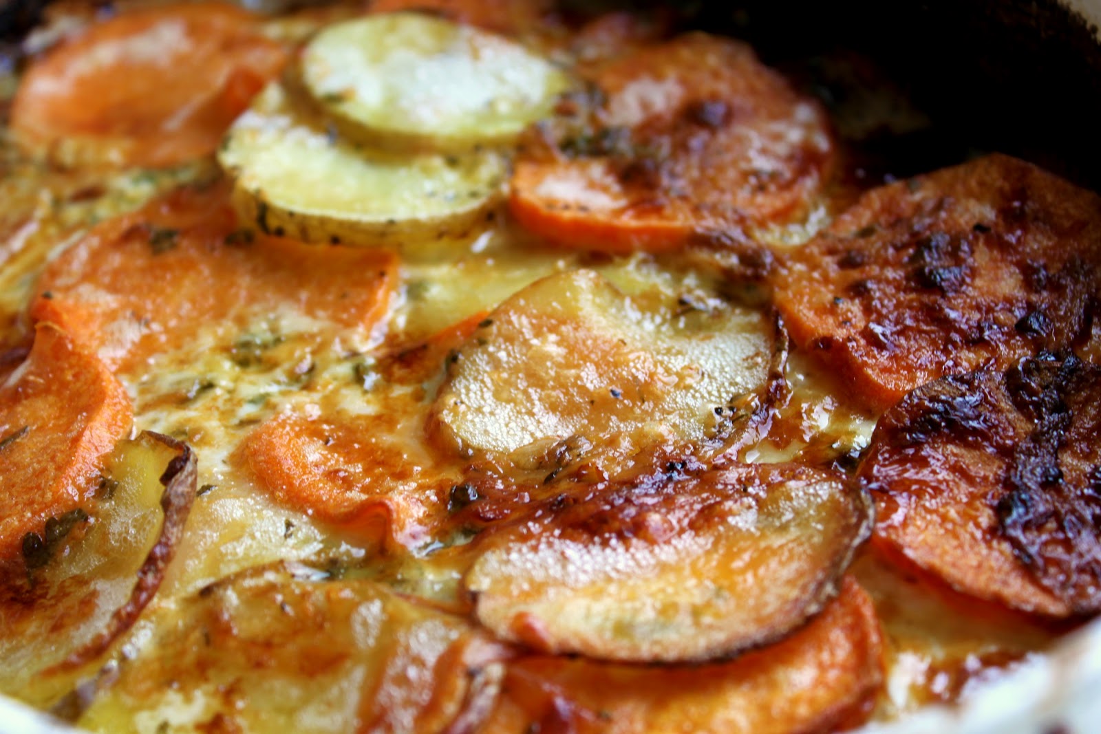 Scalloped Yukon Gold and Sweet Potato Gratin with Fresh Herbs A Feast