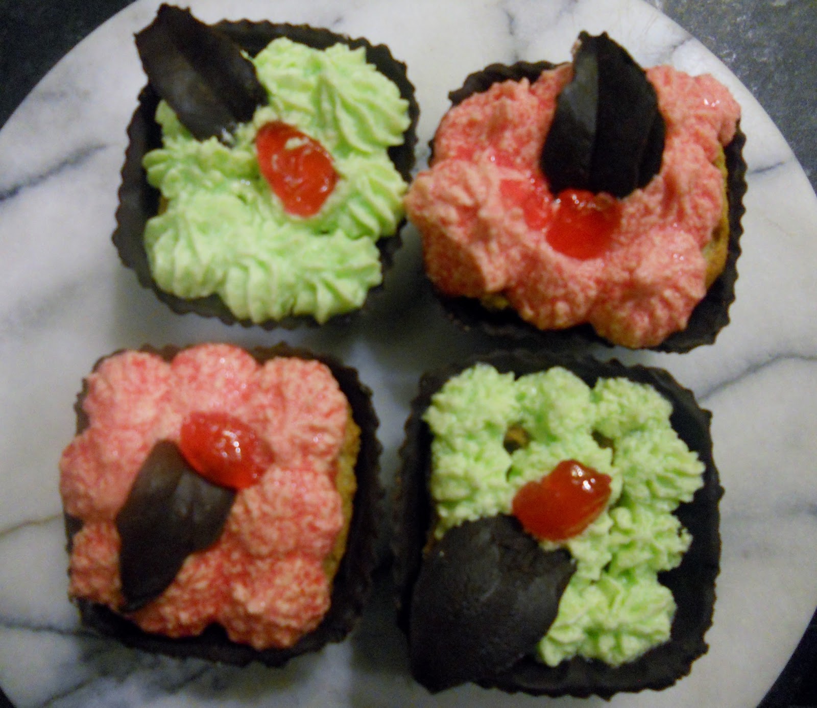 Kunzle Cakes but vegan cupcakes in a chocolate shell