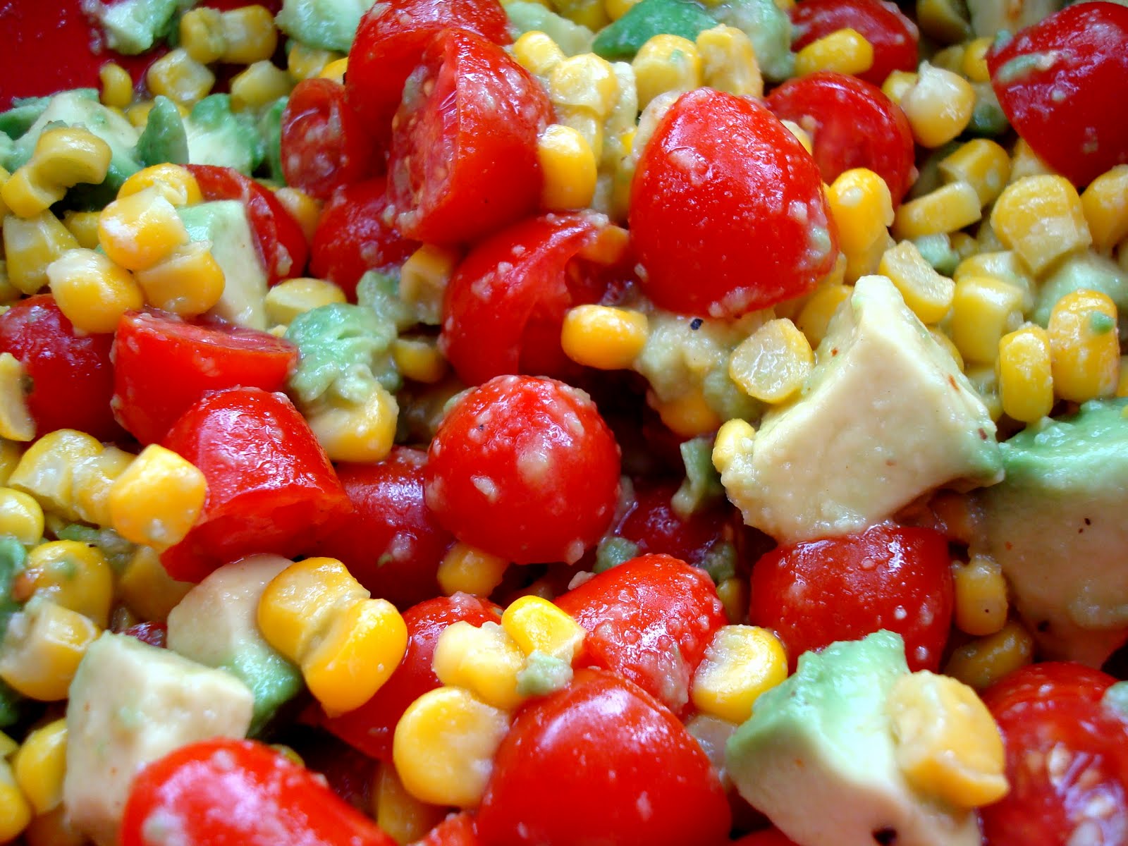 Ommy Noms Corn, Avocado, and Tomato Salad with Honey Lime Dressing