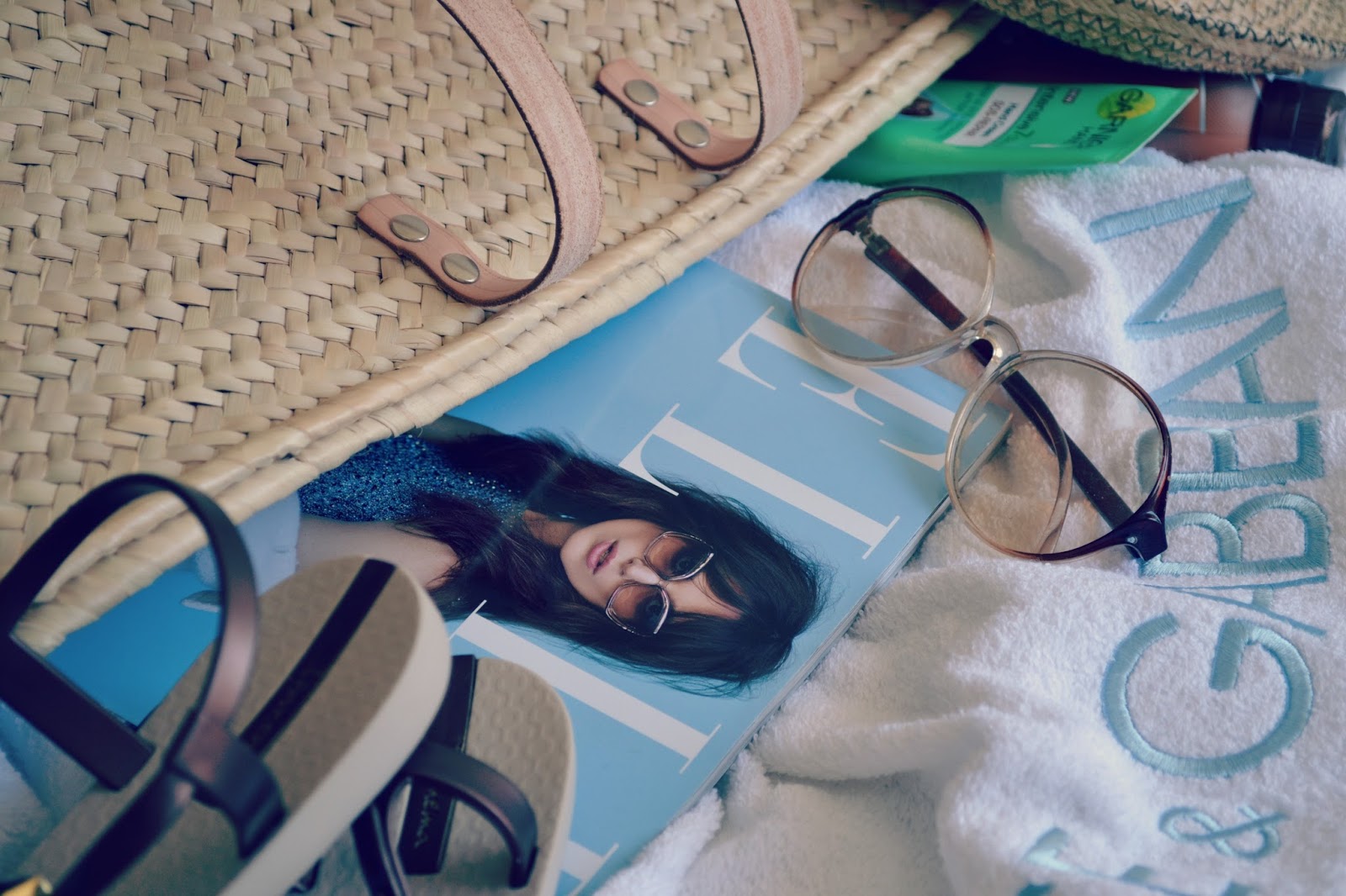vintage sunglasses dolce gabbana towel beach bag elle magazine