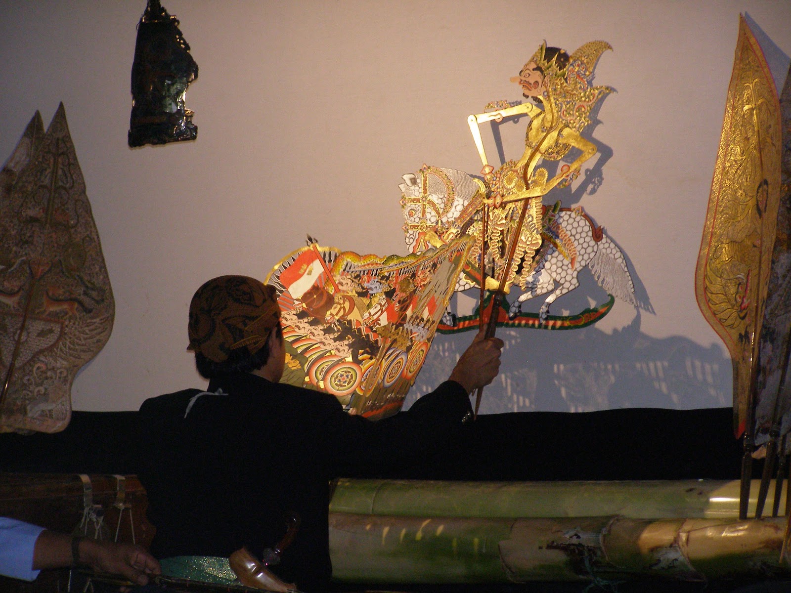 Gamelan music and shadow puppets by torchlight in the Pitt Rivers