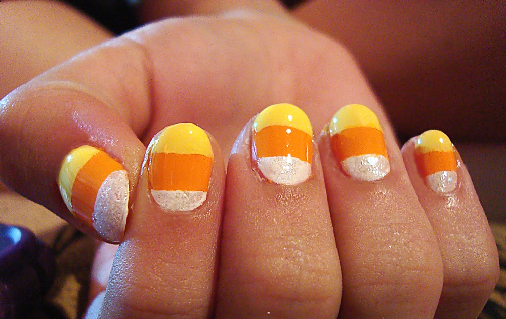 1. Candy Corn Nails: 10 Sweet and Spooky Designs for Halloween - wide 5