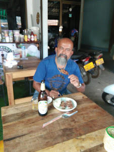 Snacks and trademark Beerlao while on the road in Vientiane.