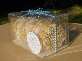 boxed hand-piped with royal icing lemon-rosemary tea biscuits