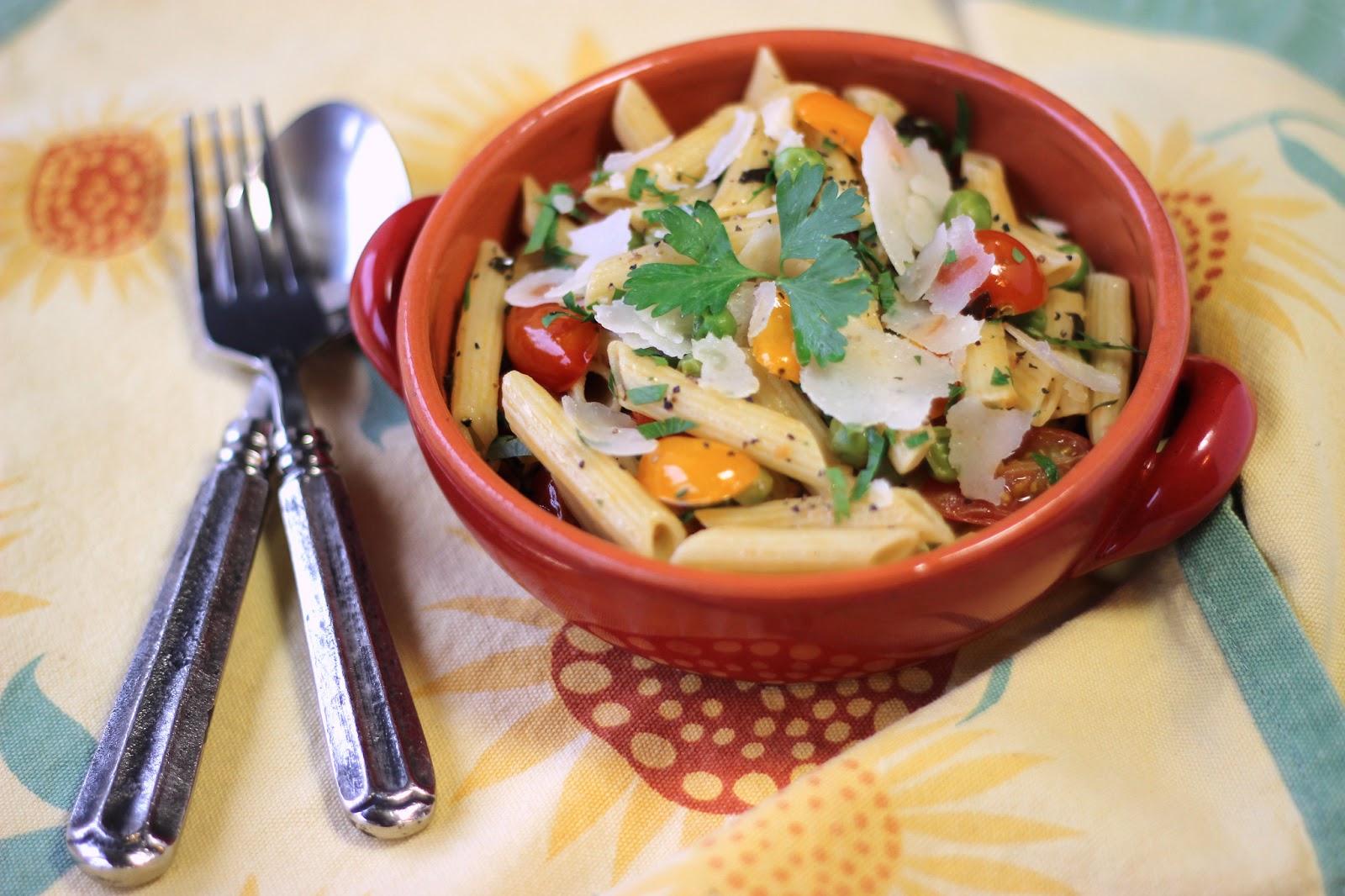 Herbed Pasta with Tomatoes Cooking on the Front Burner
