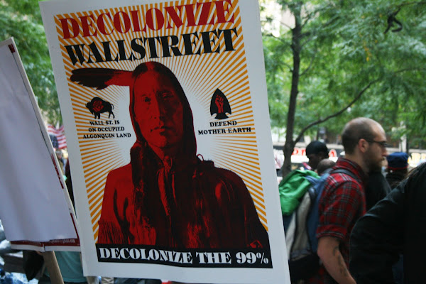 'Decolonize Wall Street' poster at Occupy Wall Street