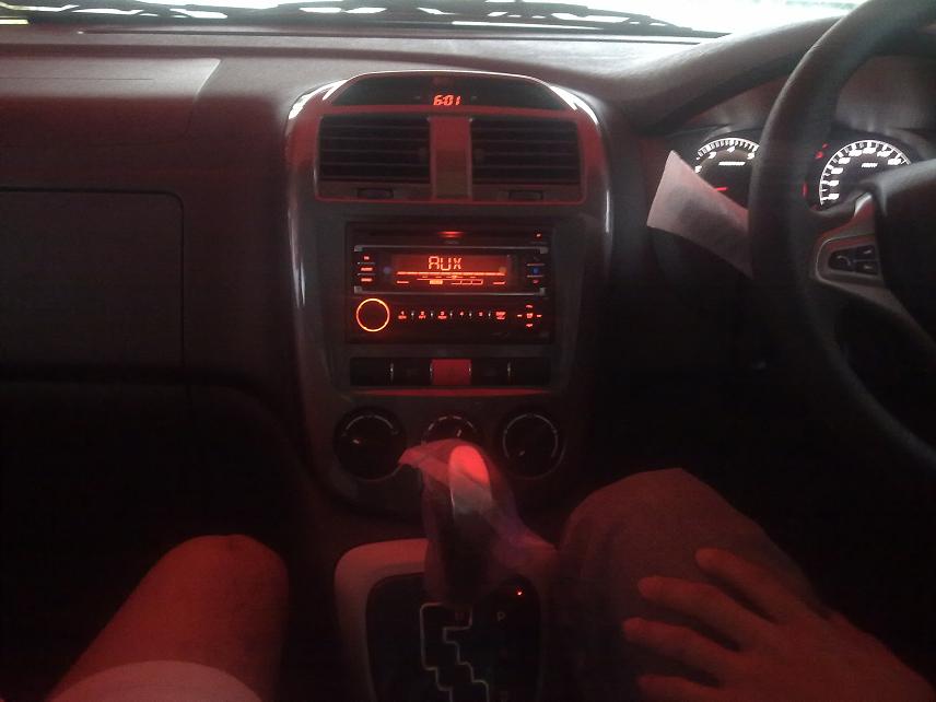 Above The CVT Module Below Lightings Dashboard And White Dash