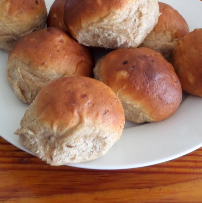 Rye Yeast Rolls:  Soft and fluffy yeast rolls made with rye flour, onions, and caraway seeds.