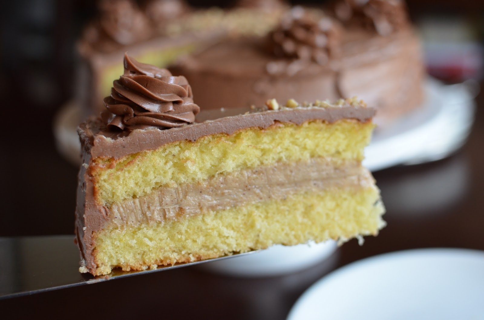 Playing with Flour Hazelnut cake with praline and milk chocolate