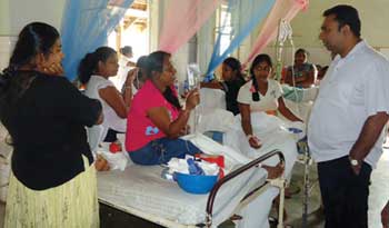 Food poisoning in the new year celebrations at Balangoda garment factory sends 200 workers to hospital Food poisoning in the new year celebrations at Balangoda garment factory sends 200 workers to hospital