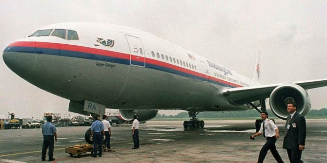 CLICK TO ENLARGE Memahami Kepiluan Keluarga Korban Pesawat Malaysia Airlines MH370