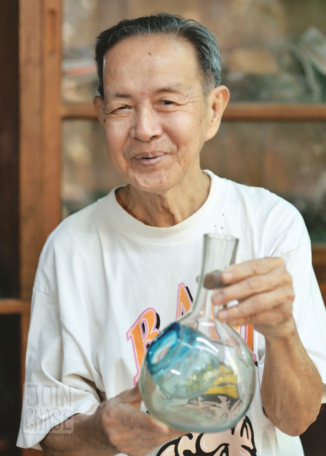 One of several family members to tend to what's left of Nagar Glass Factory just outside of Yangon, Myanmar. 