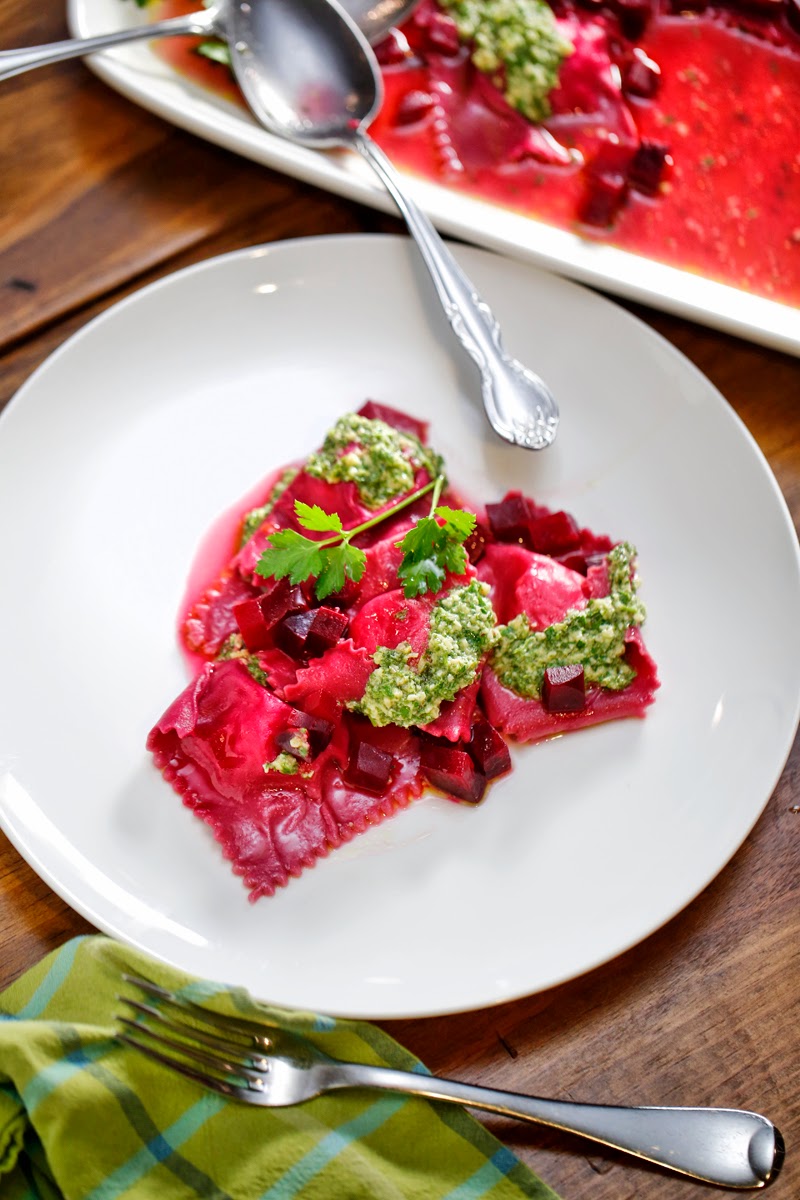 beet and goat cheese ravioli with parsley and mint pesto