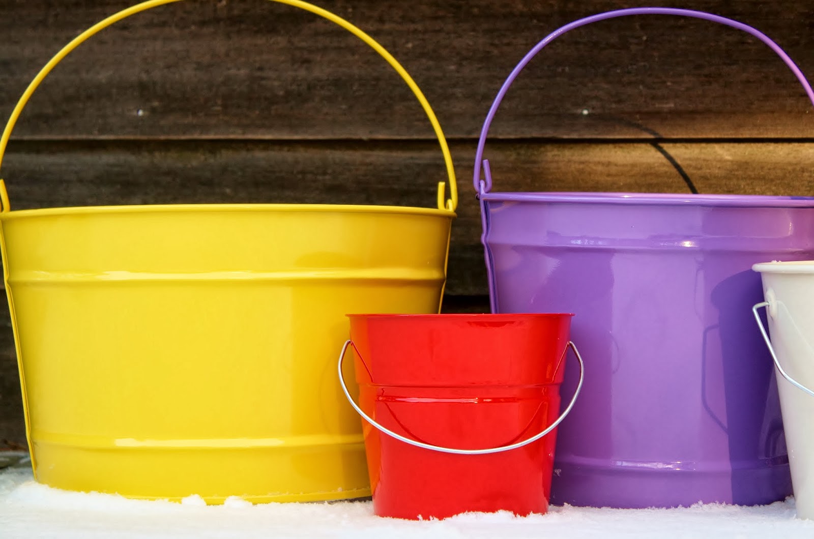 Bucket Outlet A Metal and Solid Color Bucket photoshoot in the snow.
